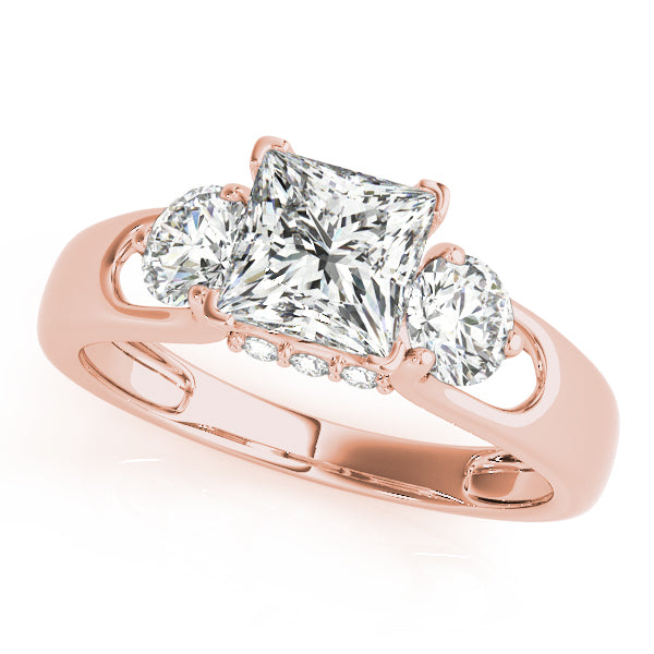 Round Three-Stone Diamond Engagement Ring · 0.56 ct tw