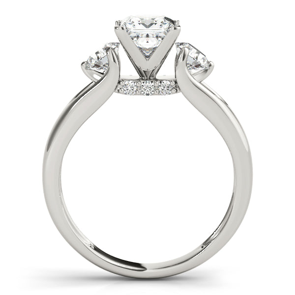 Round Three-Stone Diamond Engagement Ring · 0.56 ct tw