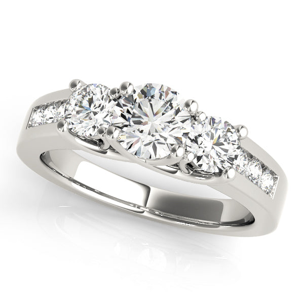 Round Three-Stone Plus Diamond Engagement Ring · 1.30 ct tw