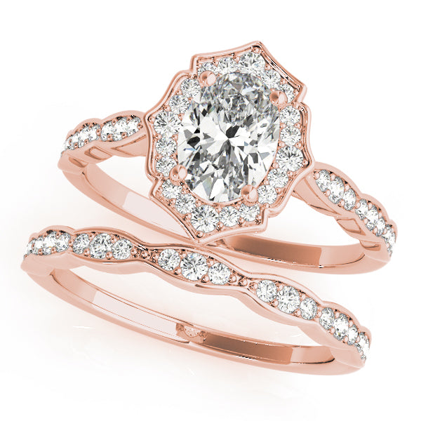 Oval Scalloped Halo Diamond Ring · 0.26 ct tw