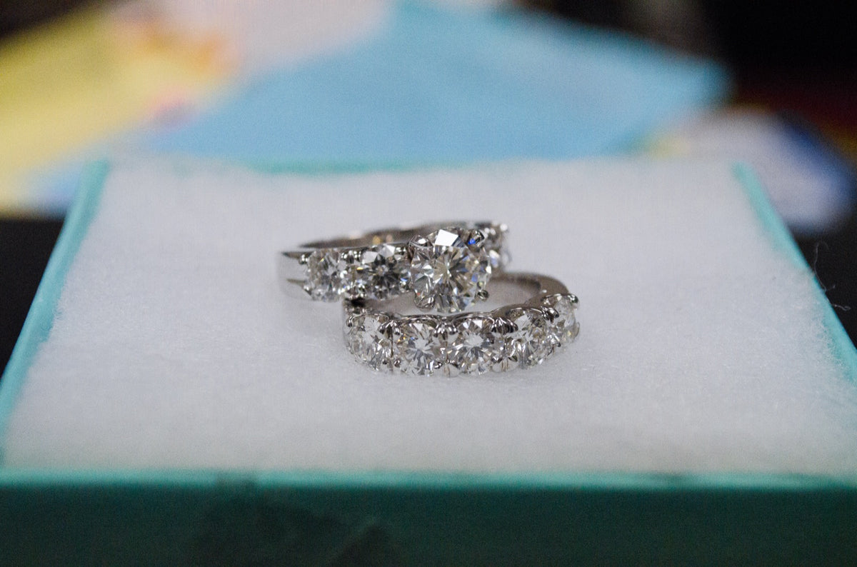 Two estate diamond rings brought in over the counter