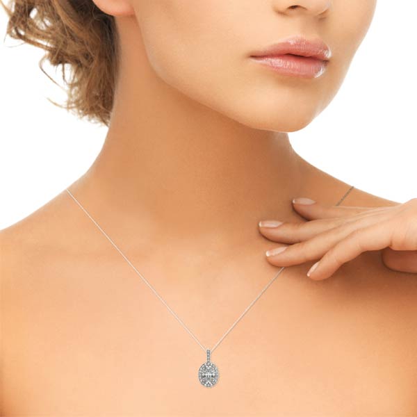 Oval Halo Diamond Pendant · 0.28 ct tw