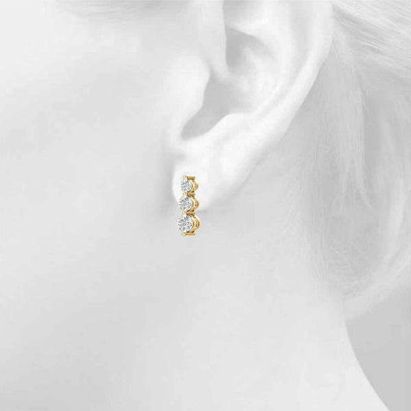 Three-Stone Diamond Earrings · 0.24 ct tw
