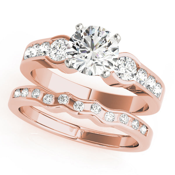 Round Three-Stone Diamond Engagement Ring · 0.54 ct tw