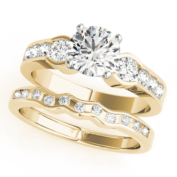 Round Three-Stone Diamond Engagement Ring · 0.54 ct tw