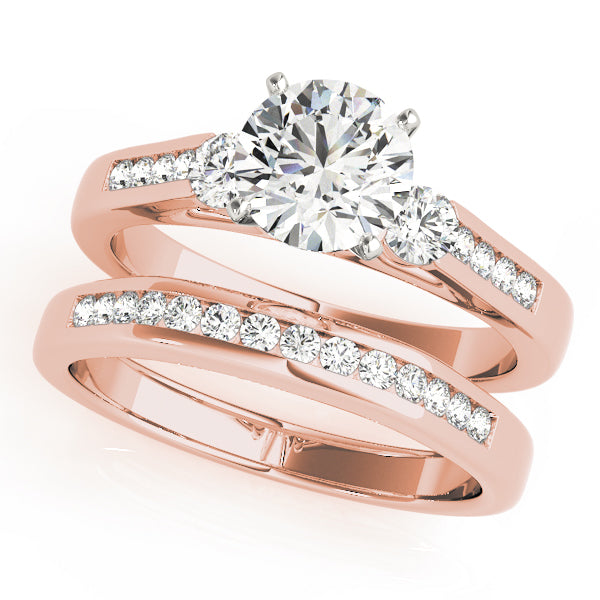 Round Three-Stone Diamond Engagement Ring · 0.44 ct tw