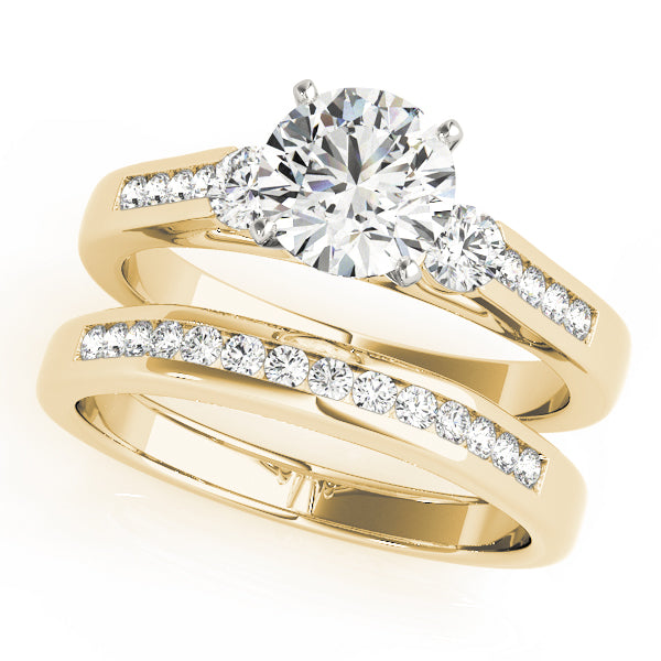 Round Three-Stone Diamond Engagement Ring · 0.44 ct tw