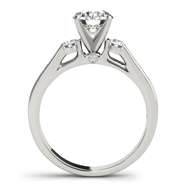 Round Three-Stone Diamond Engagement Ring · 0.44 ct tw