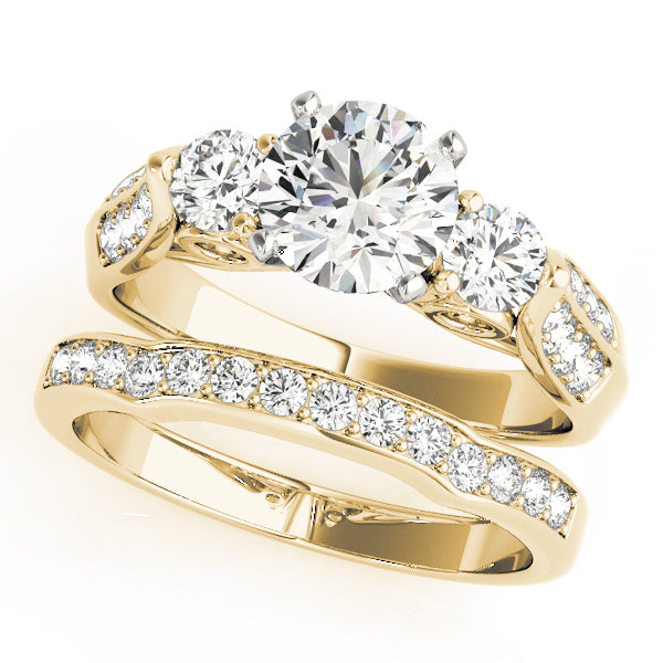 Round Three-Stone Diamond Engagement Ring · 0.65 ct tw