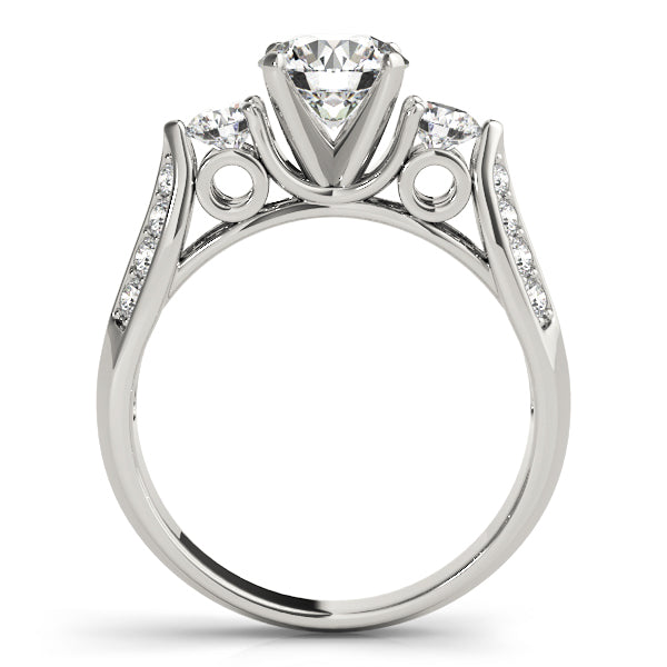 Round Three-Stone Diamond Engagement Ring · 0.65 ct tw