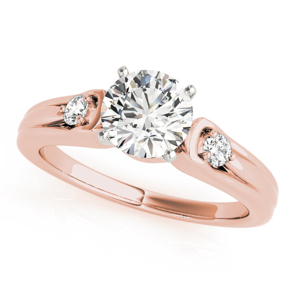 Round Three-Stone Diamond Engagement Ring · 0.10 ct tw