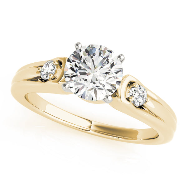 Round Three-Stone Diamond Engagement Ring · 0.10 ct tw