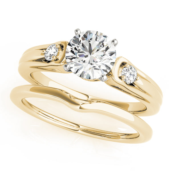 Round Three-Stone Diamond Engagement Ring · 0.10 ct tw