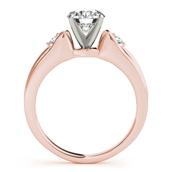Round Three-Stone Diamond Engagement Ring · 0.10 ct tw