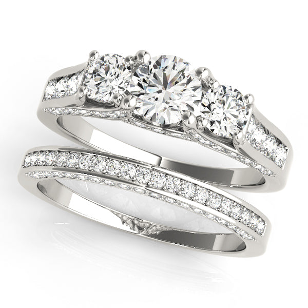 Round Three-Stone Diamond Engagement Ring · 1.26 ct tw
