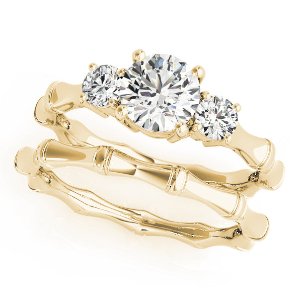 Round Three-Stone Diamond Engagement Ring · 1.09 ct tw