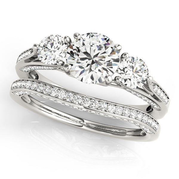 Round Three-Stone Diamond Engagement Ring · 1.69 ct tw