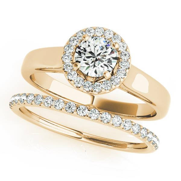 Round Halo Diamond Engagement Ring · 0.10 ct tw