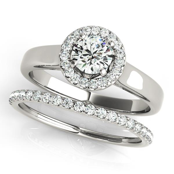 Round Halo Diamond Engagement Ring · 0.10 ct tw