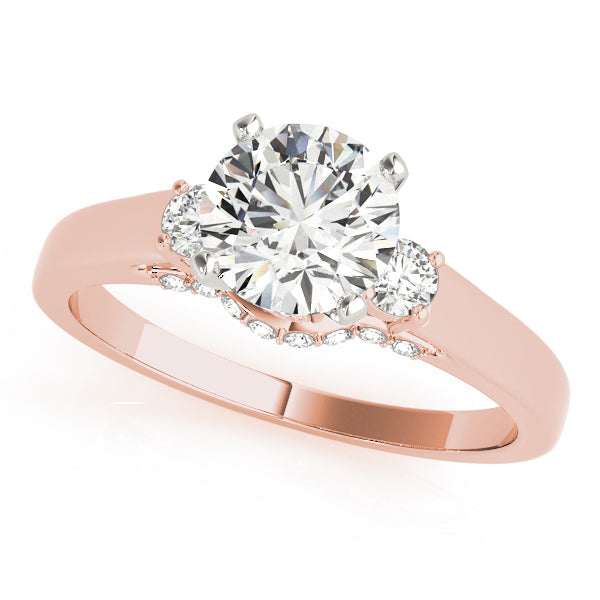 Round Three-Stone Diamond Engagement Ring · 0.28 ct tw