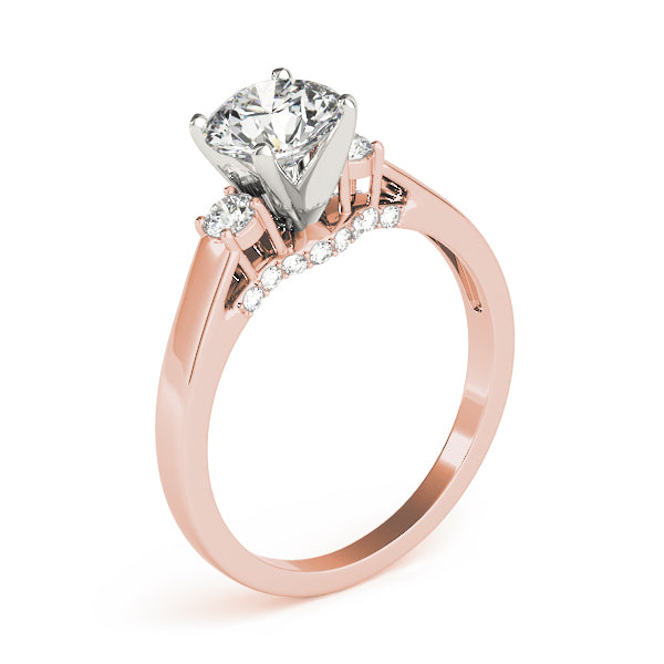 Round Three-Stone Diamond Engagement Ring · 0.28 ct tw