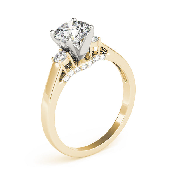 Round Three-Stone Diamond Engagement Ring · 0.28 ct tw