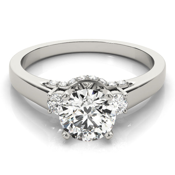 Round Three-Stone Diamond Engagement Ring · 0.28 ct tw