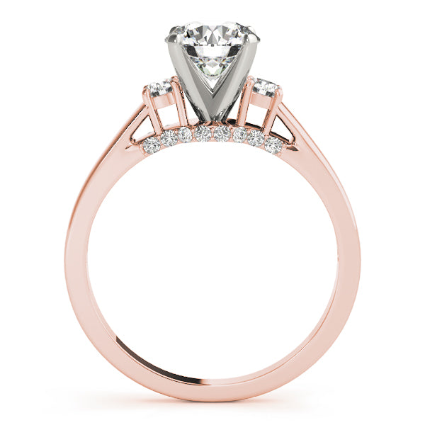 Round Three-Stone Diamond Engagement Ring · 0.28 ct tw