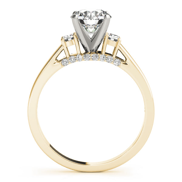 Round Three-Stone Diamond Engagement Ring · 0.28 ct tw