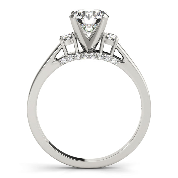 Round Three-Stone Diamond Engagement Ring · 0.28 ct tw