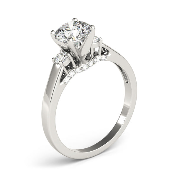 Round Three-Stone Diamond Engagement Ring · 0.28 ct tw