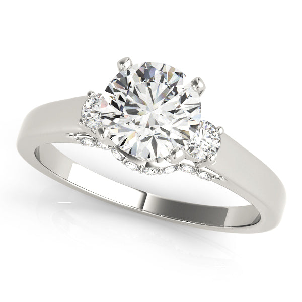 Round Three-Stone Diamond Engagement Ring · 0.28 ct tw