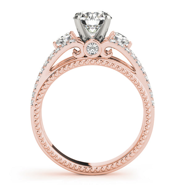 Round Three-Stone Diamond Engagement Ring · 0.51 ct tw