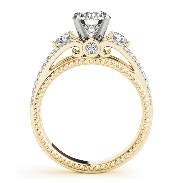 Round Three-Stone Diamond Engagement Ring · 0.51 ct tw