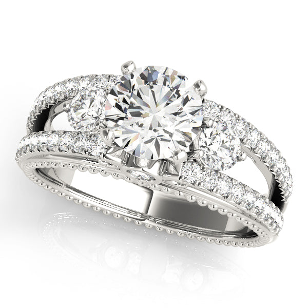 Round Three-Stone Diamond Engagement Ring · 0.51 ct tw