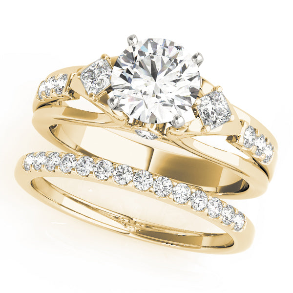 Round Three-Stone Diamond Engagement Ring · 0.29 ct tw