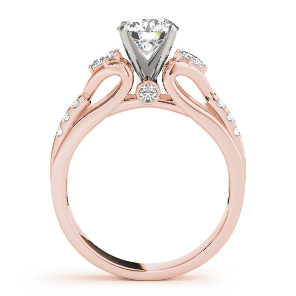 Round Three-Stone Diamond Engagement Ring · 0.29 ct tw