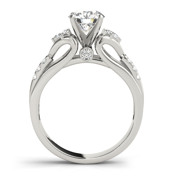 Round Three-Stone Diamond Engagement Ring · 0.29 ct tw