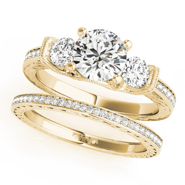 Round Three-Stone Diamond Engagement Ring · 0.72 ct tw