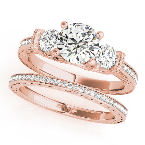 Round Three-Stone Diamond Engagement Ring · 0.72 ct tw