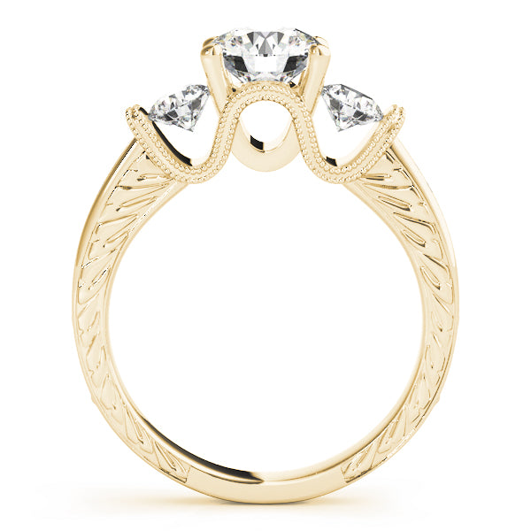 Round Three-Stone Diamond Engagement Ring · 0.72 ct tw