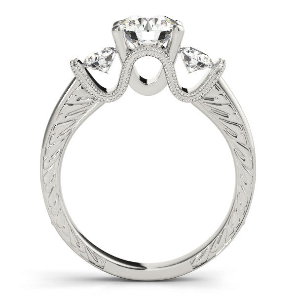 Round Three-Stone Diamond Engagement Ring · 0.72 ct tw