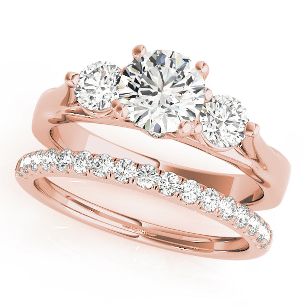 Round Three-Stone Diamond Engagement Ring · 0.43 ct tw