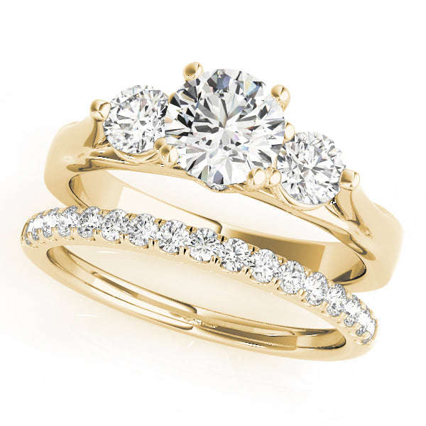 Round Three-Stone Diamond Engagement Ring · 0.43 ct tw