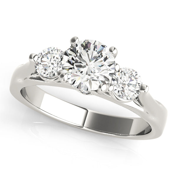 Round Three-Stone Diamond Engagement Ring · 0.43 ct tw