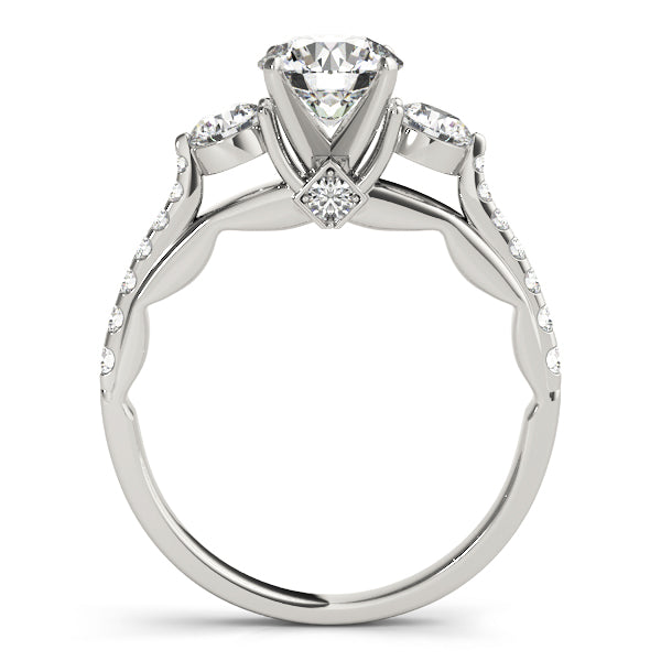 Round Three-Stone Diamond Engagement Ring · 0.61 ct tw