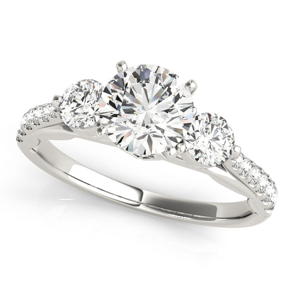 Round Three-Stone Diamond Engagement Ring · 0.61 ct tw