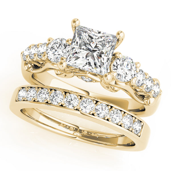 Round Three-Stone Diamond Engagement Ring · 0.72 ct tw