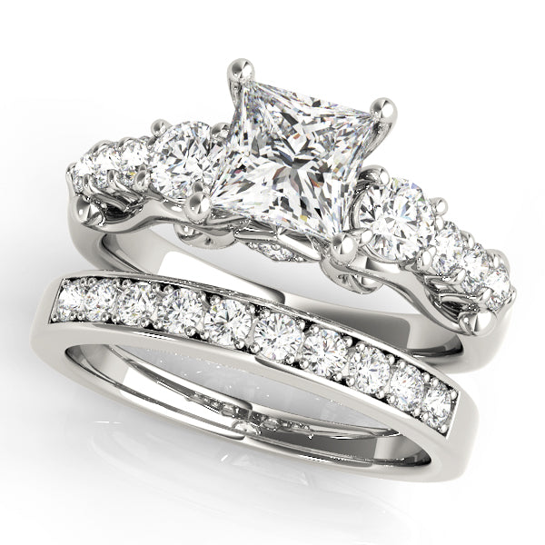 Round Three-Stone Diamond Engagement Ring · 0.72 ct tw