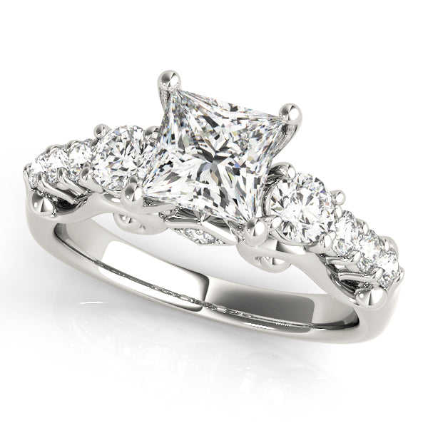 Round Three-Stone Diamond Engagement Ring · 0.72 ct tw
